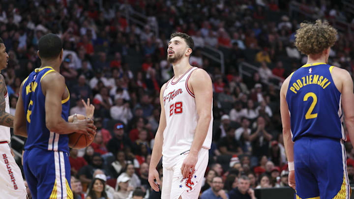 Mar 5, 2026; Houston, Texas, USA; Houston Rockets center Alperen Sengun (28) reacts after a play during the fourth quarter against the Golden State Warriors at Toyota Center. Mandatory Credit: Troy Taormina-Imagn Images