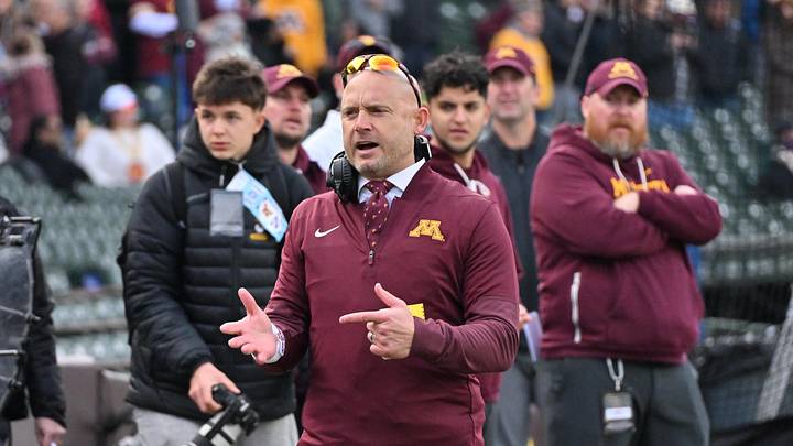 Nov 22, 2025; Chicago, Illinois, USA; Minnesota Golden Gophers head coach P.J. Fleck directs his team against the Northwestern Wildcats during the first half at Wrigley Field. Mandatory Credit: Patrick Gorski-Imagn Images Nov 22, 2025; Chicago, Illinois, USA; Minnesota Golden Gophers head coach P.J. Fleck directs his team against the Northwestern Wildcats during the first half at Wrigley Field. Mandatory Credit: Patrick Gorski-Imagn Images