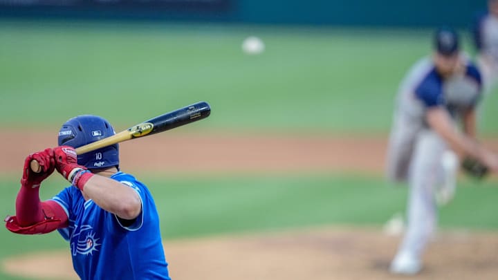Oklahoma City outfielder Ryan Ward (10) hits a triple off of Sugar Land pitcher Nick Robertson (40) during a minor league baseball game between the Oklahoma City Comets and the Sugar Land Space Cowboys at Chickasaw Bricktown Ballpark in Oklahoma City, on July 10.