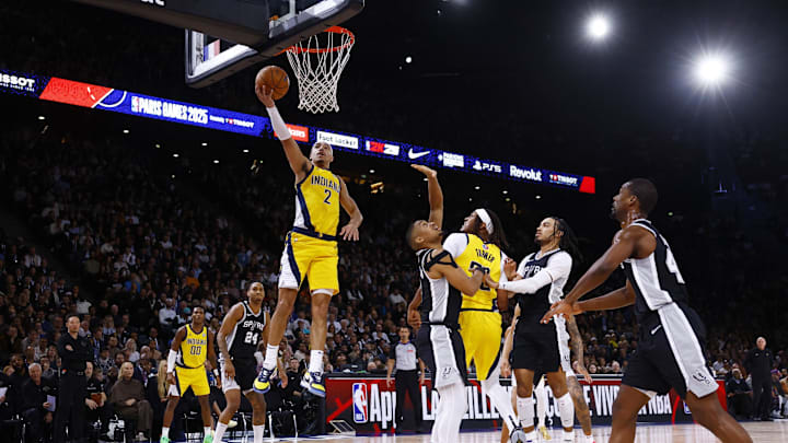 [US, Mexico, & Canada customers only] Jan 25, 2025; Paris, FRANCE; Indiana Pacers player Andrew Nembhard shoots against the San Antonio Spurs in the Paris Games 2025 NBA basketball game at Accor Arena. Mandatory Credit: Stephanie Lecocq/Reuters via Imagn Images