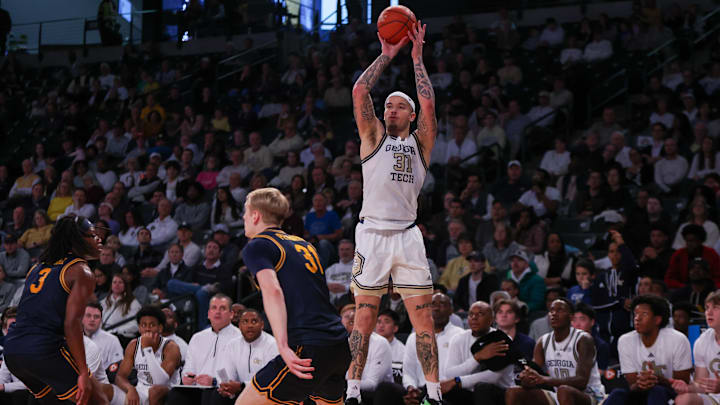 Feb 15, 2025; Atlanta, Georgia, USA; Georgia Tech Yellow Jackets forward Duncan Powell (31) shoots against the California Golden Bears in the second half at McCamish Pavilion. Mandatory Credit: Brett Davis-Imagn Images