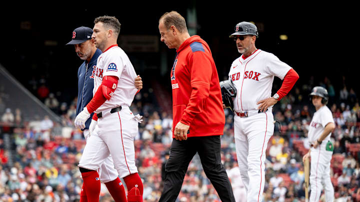 Boston Red Sox third baseman Alex Bregman leaves a game at Fenway Park with an injury.