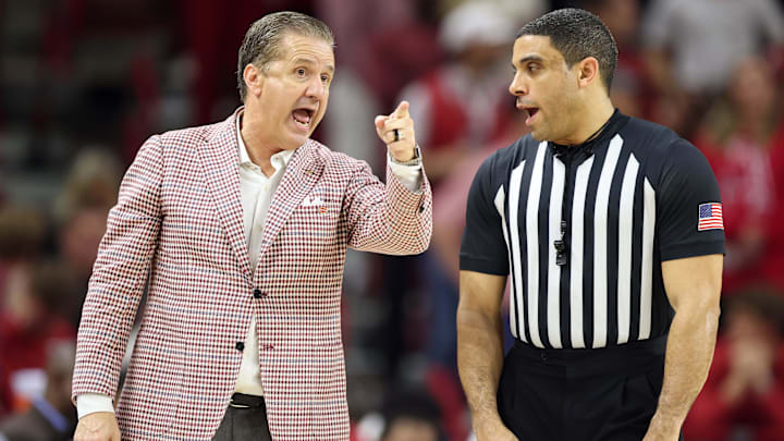 Mar 4, 2026; Fayetteville, Arkansas, USA; Arkansas Razorbacks head coach John Calipari talks to an official during the second half against the Texas Longhorns at Bud Walton Arena. Arkansas won 105-85. Mandatory Credit: Nelson Chenault-Imagn Images