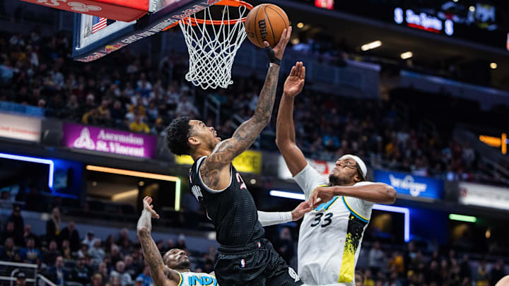 Nov 27, 2024; Indianapolis, Indiana, USA; Portland Trail Blazers guard Anfernee Simons (1) shoots the ball while Indiana Pacers center Myles Turner (33) defends in the second half at Gainbridge Fieldhouse. Mandatory Credit: Trevor Ruszkowski-Imagn Images Nov 27, 2024; Indianapolis, Indiana, USA; Portland Trail Blazers guard Anfernee Simons (1) shoots the ball while Indiana Pacers center Myles Turner (33) defends in the second half at Gainbridge Fieldhouse. Mandatory Credit: Trevor Ruszkowski-Imagn Images