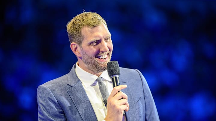 Jan 5, 2022; Dallas, Texas, USA; Former Dallas Mavericks player Dirk Nowitzki speaks to the fans as Nowitzki has his number 41 jersey retired after the game between the Dallas Mavericks and the Golden State Warriors at the American Airlines Center. Mandatory Credit: Jerome Miron-Imagn Images Jan 5, 2022; Dallas, Texas, USA; Former Dallas Mavericks player Dirk Nowitzki speaks to the fans as Nowitzki has his number 41 jersey retired after the game between the Dallas Mavericks and the Golden State Warriors at the American Airlines Center. Mandatory Credit: Jerome Miron-Imagn Images