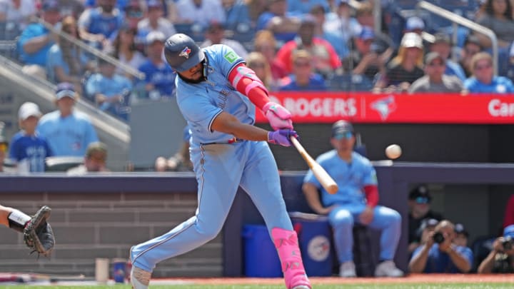 oronto Blue Jays first base Vladimir Guerrero Jr. (27) hits an RBI double against the Los Angeles Angels during the fifth inning at Rogers Centre on Aug 25. oronto Blue Jays first base Vladimir Guerrero Jr. (27) hits an RBI double against the Los Angeles Angels during the fifth inning at Rogers Centre on Aug 25.