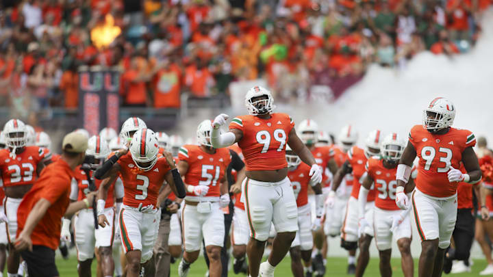 Sep 9, 2023; Miami Gardens, Florida, USA; Miami Hurricanes defensive lineman Ahmad Moten (99) reacts as he takes the field prior to the game against the Texas A&M Aggies at Hard Rock Stadium. Mandatory Credit: Sam Navarro-USA TODAY Sports