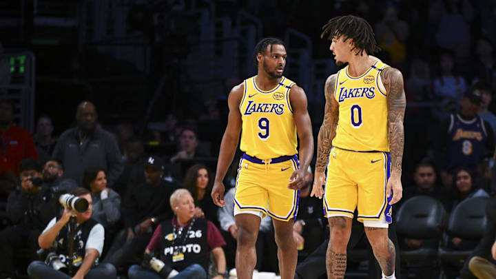 Nov 8, 2024; Los Angeles, California, USA; Los Angeles Lakers guard Jalen Hood-Schifino (0) and guard Bronny James (9) during the second half against the Philadelphia 76ers at Crypto.com Arena. Mandatory Credit: Jonathan Hui-Imagn Images Nov 8, 2024; Los Angeles, California, USA; Los Angeles Lakers guard Jalen Hood-Schifino (0) and guard Bronny James (9) during the second half against the Philadelphia 76ers at Crypto.com Arena. Mandatory Credit: Jonathan Hui-Imagn Images