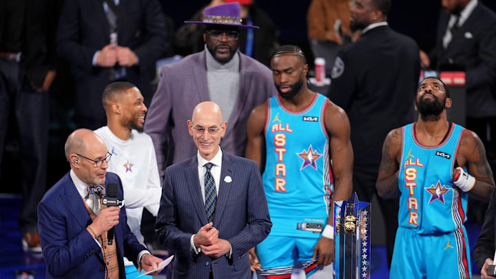 Feb 16, 2025; San Francisco, CA, USA; Ernie Johnson, Jr. speaks with NBA commissioner Adam Silver after the 2025 NBA All Star Game at Chase Center. Mandatory Credit: Cary Edmondson-Imagn Images