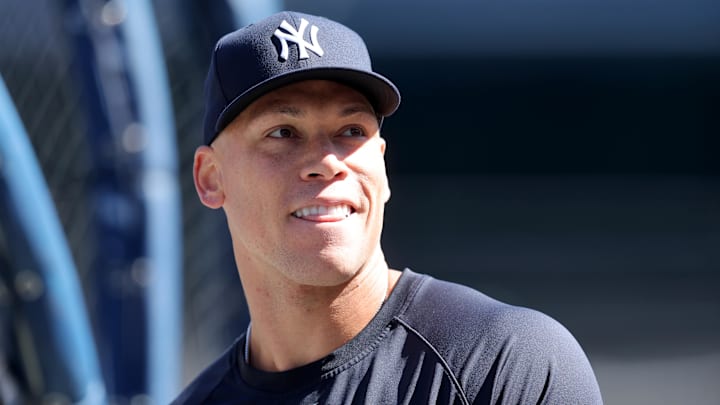 Mar 27, 2025; Bronx, New York, USA; New York Yankees right fielder Aaron Judge (99) stands outside the cage during batting practice before a game against the Milwaukee Brewers at Yankee Stadium. Mandatory Credit: Brad Penner-Imagn Images Mar 27, 2025; Bronx, New York, USA; New York Yankees right fielder Aaron Judge (99) stands outside the cage during batting practice before a game against the Milwaukee Brewers at Yankee Stadium. Mandatory Credit: Brad Penner-Imagn Images