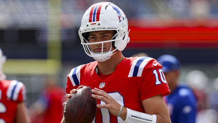 Sep 21, 2025; Foxborough, Massachusetts, USA; New England Patriots quarterback Drake Maye (10) warms up before the game aginst the Pittsburgh Steelers at Gillette Stadium. Mandatory Credit: Paul Rutherford-Imagn Images