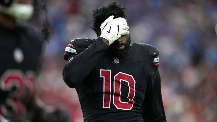 Arizona Cardinals linebacker Josh Sweat (10) walks off the field after the defense gives up a touchdown to the Detroit Lions Arizona Cardinals linebacker Josh Sweat (10) walks off the field after the defense gives up a touchdown to the Detroit Lions