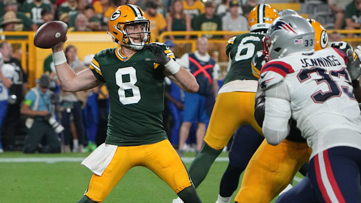 Green Bay Packers quarterback Sean Clifford (8) throws downfield during the second quarter of their