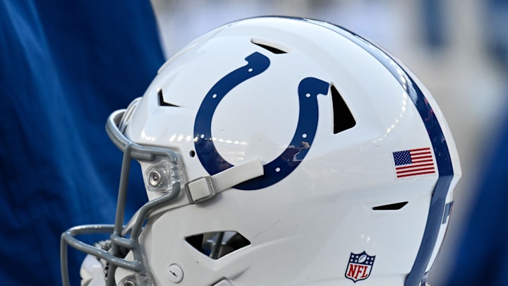 An Indianapolis Colts helmet sits on an equipment case during the first half against the New England Patriots