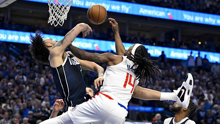 Apr 26, 2024; Dallas, Texas, USA; Dallas Mavericks center Dereck Lively II (2) blocks a shot by LA Apr 26, 2024; Dallas, Texas, USA; Dallas Mavericks center Dereck Lively II (2) blocks a shot by LA