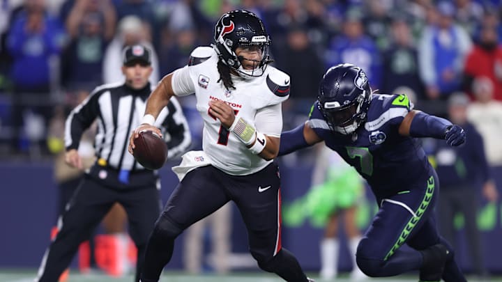 Oct 20, 2025; Seattle, Washington, USA; Houston Texans quarterback C.J. Stroud (7) is chased by Seattle Seahawks linebacker Uchenna Nwosu (7) during the first quarter at Lumen Field. Mandatory Credit: Kevin Ng-Imagn Images Oct 20, 2025; Seattle, Washington, USA; Houston Texans quarterback C.J. Stroud (7) is chased by Seattle Seahawks linebacker Uchenna Nwosu (7) during the first quarter at Lumen Field. Mandatory Credit: Kevin Ng-Imagn Images