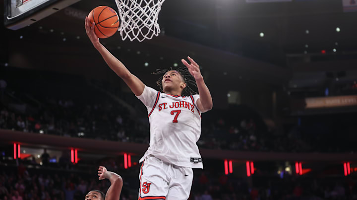 Jan 22, 2025; New York, New York, USA;  St. John's basketball guard Simeon Wilcher (7) goes in for a layup in the second half against the Xavier Musketeers at Madison Square Garden.