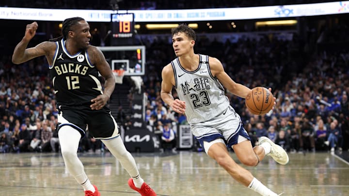 Jan 10, 2025; Orlando, Florida, USA; Orlando Magic forward Tristan da Silva (23) does the ball past Milwaukee Bucks forward Taurean Prince (12) in the fourth quarter at Kia Center. Mandatory Credit: Nathan Ray Seebeck-Imagn Images Jan 10, 2025; Orlando, Florida, USA; Orlando Magic forward Tristan da Silva (23) does the ball past Milwaukee Bucks forward Taurean Prince (12) in the fourth quarter at Kia Center. Mandatory Credit: Nathan Ray Seebeck-Imagn Images
