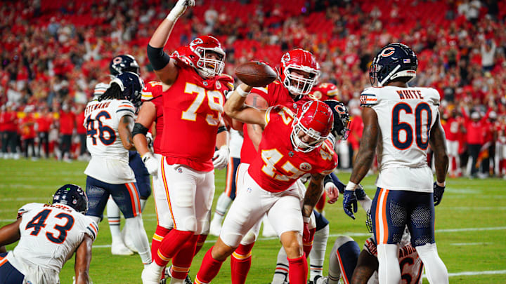Kansas City Chiefs tight end Baylor Cupp (47) spikes the ball after scoring against the Chicago Bears Mandatory Credit: Denny Medley-Imagn Images