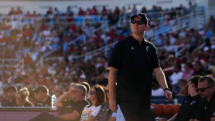 Oct 7, 2026; Mason, OH, USA; Cincinnati Bearcats head coach Jerrod Calhoun works the sideline during the game against the Ohio State Buckeyes in the second half during the 2026 CareSource Invitational at the Lindner Family Tennis Center. Mandatory Credit: Aaron Doster-Imagn Images Oct 7, 2026; Mason, OH, USA; Cincinnati Bearcats head coach Jerrod Calhoun works the sideline during the game against the Ohio State Buckeyes in the second half during the 2026 CareSource Invitational at the Lindner Family Tennis Center. Mandatory Credit: Aaron Doster-Imagn Images