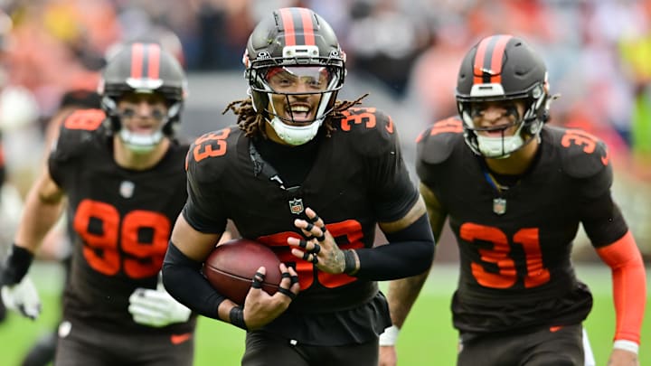 Oct 19, 2025; Cleveland, Ohio, USA; Cleveland Browns safety Ronnie Hickman Jr. (33) celebrates after intercepting a pass during the second half against the Miami Dolphins at Huntington Bank Field. Mandatory Credit: Ken Blaze-Imagn Images Oct 19, 2025; Cleveland, Ohio, USA; Cleveland Browns safety Ronnie Hickman Jr. (33) celebrates after intercepting a pass during the second half against the Miami Dolphins at Huntington Bank Field. Mandatory Credit: Ken Blaze-Imagn Images