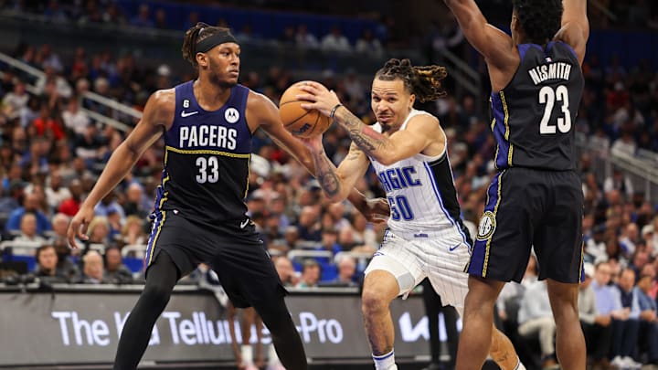 Jan 25, 2023; Orlando, Florida, USA;  Orlando Magic guard Cole Anthony (50) drives to the hoop past Indiana Pacers center Myles Turner (33) in the third quarter at Amway Center. Mandatory Credit: Nathan Ray Seebeck-Imagn Images