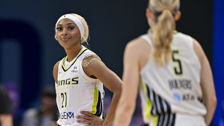 Jul 28, 2025; Arlington, Texas, USA; Dallas Wings guard Paige Bueckers (5) and guard DiJonai Carrington (21) during the game between the Dallas Wings and the New York Liberty at College Park Center. Mandatory Credit: Jerome Miron-Imagn Images