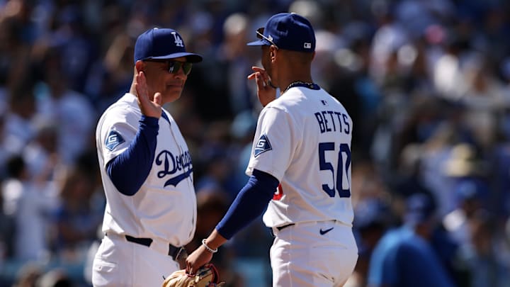 Jun 5, 2025; Los Angeles, California, USA; Los Angeles Dodgers manager Dave Roberts (30) and shortstop Mookie Betts (50) celebrate after defeating the New York Mets at Dodger Stadium. Mandatory Credit: Jason Parkhurst-Imagn Images Jun 5, 2025; Los Angeles, California, USA; Los Angeles Dodgers manager Dave Roberts (30) and shortstop Mookie Betts (50) celebrate after defeating the New York Mets at Dodger Stadium. Mandatory Credit: Jason Parkhurst-Imagn Images