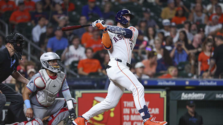 Houston Astros right fielder Trey Cabbage (38) hits an RBI double during the sixth inning against the Miami Marlins at Minute Maid Park in 2024.