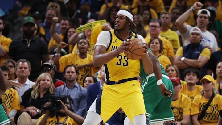 May 25, 2024; Indianapolis, Indiana, USA; Indiana Pacers center Myles Turner (33) grabs a rebound against the Boston Celtics during the fourth quarter of game three of the eastern conference finals in the 2024 NBA playoffs at Gainbridge Fieldhouse. Mandatory Credit: Trevor Ruszkowski-USA TODAY Sports