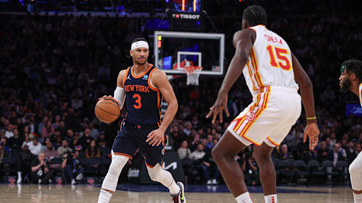Mar 5, 2024; New York, New York, USA; New York Knicks guard Josh Hart (3) dribbles against Atlanta Hawks center Clint Capela (15) during the second half at Madison Square Garden. Mandatory Credit: Vincent Carchietta-Imagn Images