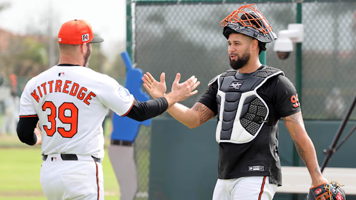 Feb 16, 2025; Sarasota, FL, USA;  Baltimore Orioles pitcher Andrew Kittredge (39) and catcher Gary Sanchez (99) after a bullpen session at Ed Smith Stadium