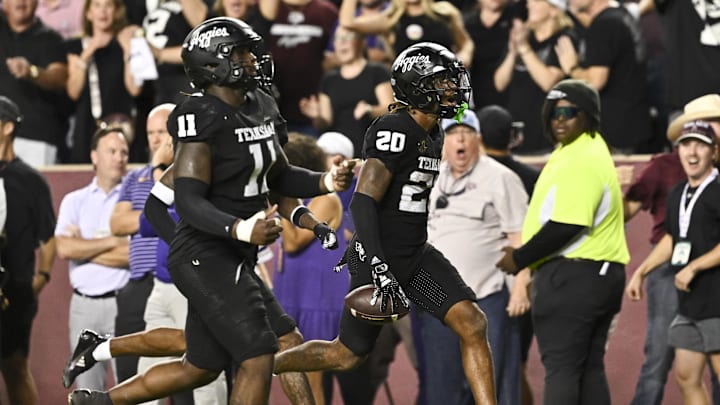 Texas A&M Aggies defensive back BJ Mayes reacts after intercepting a pass against the LSU Tigers.