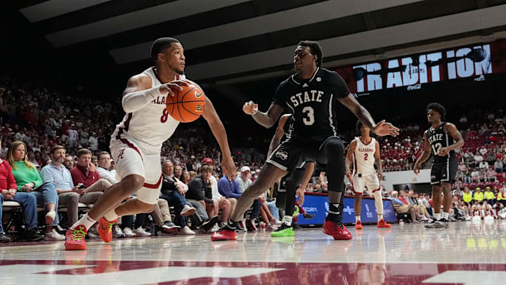Feb 25, 2025; Tuscaloosa, AL, USA; Alabama guard Chris Youngblood (8) starts a drive along the baseline as he is guarded by Mississippi State forward Keshawn Murphy (3) at Coleman Coliseum. Alabama defeated Mississippi State 111-73. Mandatory Credit: Gary Cosby Jr.-Tuscaloosa News Feb 25, 2025; Tuscaloosa, AL, USA; Alabama guard Chris Youngblood (8) starts a drive along the baseline as he is guarded by Mississippi State forward Keshawn Murphy (3) at Coleman Coliseum. Alabama defeated Mississippi State 111-73. Mandatory Credit: Gary Cosby Jr.-Tuscaloosa News