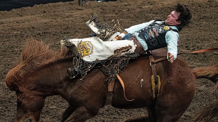 Cole Reiner rides during the bareback competition during Cinch World's Toughest Rodeo at Casey's Center on Friday, Jan. 9, 2026 in Des Moines.