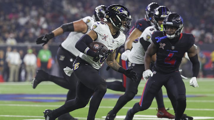 Dec 25, 2024; Houston, Texas, USA;  Baltimore Ravens wide receiver Tylan Wallace (16) runs with the ball during the fourth quarter against the Houston Texans at NRG Stadium. Mandatory Credit: Troy Taormina-Imagn Images