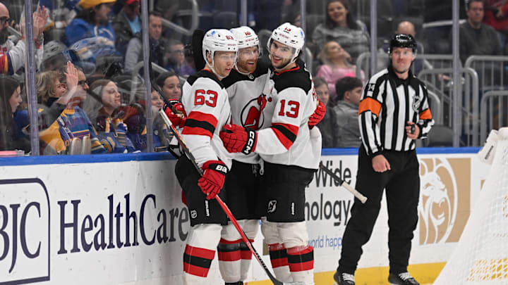 Feb 28, 2026; St. Louis, Missouri, USA; New Jersey Devils center Nico Hischier (13) is congratulated after scoring an empty net goal against the St. Louis Blues in the third period at Enterprise Center. Mandatory Credit: Joe Puetz-Imagn Images Feb 28, 2026; St. Louis, Missouri, USA; New Jersey Devils center Nico Hischier (13) is congratulated after scoring an empty net goal against the St. Louis Blues in the third period at Enterprise Center. Mandatory Credit: Joe Puetz-Imagn Images