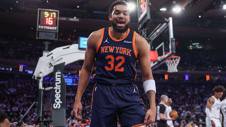 Mar 25, 2025; New York, New York, USA;  New York Knicks center Karl-Anthony Towns (32) reacts after getting fouled in the first quarter against the Dallas Mavericks at Madison Square Garden. Mandatory Credit: Wendell Cruz-Imagn Images