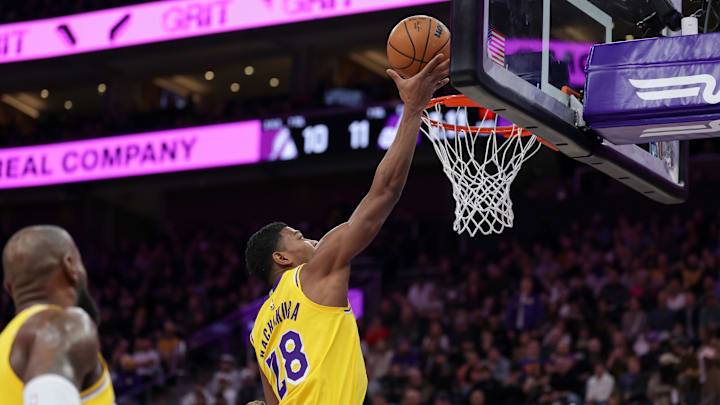 Feb 12, 2025; Salt Lake City, Utah, USA;  Los Angeles Lakers forward Rui Hachimura (28) shoots during the first quarter against the Utah Jazz at Delta Center. Mandatory Credit: Chris Nicoll-Imagn Images