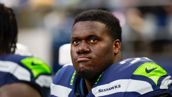Nov 12, 2023; Seattle, Washington, USA; Seattle Seahawks center Olu Oluwatimi (51) sits on the sideline during the third quarter against the Washington Commanders at Lumen Field. Mandatory Credit: Joe Nicholson-USA TODAY Sports