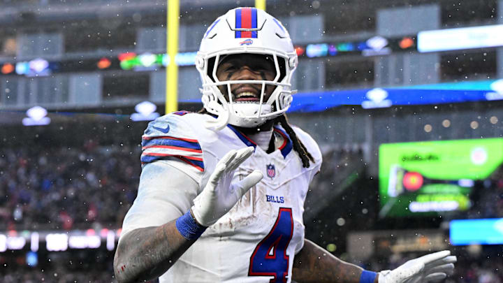 Dec 14, 2025; Foxborough, Massachusetts, USA; Buffalo Bills running back James Cook III (4) reacts after scoring a touchdown against the New England Patriots