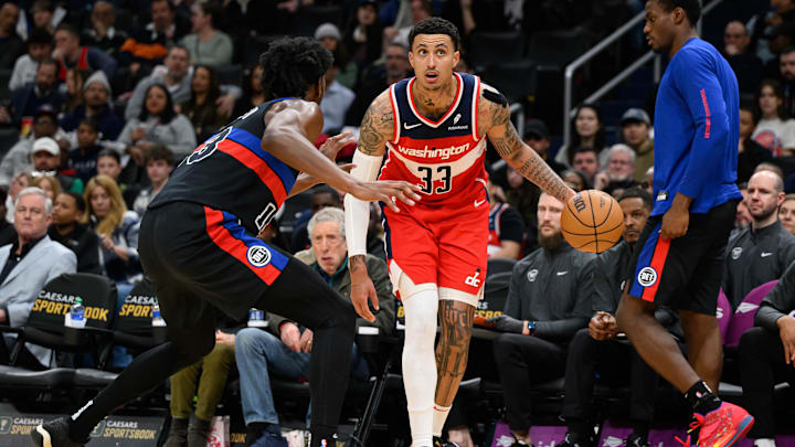 Mar 29, 2024; Washington, District of Columbia, USA; Washington Wizards forward Kyle Kuzma (33) drives to the basket against Detroit Pistons center James Wiseman (13) during the second quarter at Capital One Arena. Mandatory Credit: Reggie Hildred-Imagn Images Mar 29, 2024; Washington, District of Columbia, USA; Washington Wizards forward Kyle Kuzma (33) drives to the basket against Detroit Pistons center James Wiseman (13) during the second quarter at Capital One Arena. Mandatory Credit: Reggie Hildred-Imagn Images