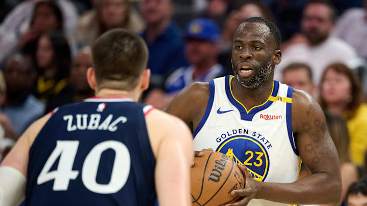 Golden State Warriors forward Draymond Green (23) controls the ball against LA Clippers center Ivica Zubac.