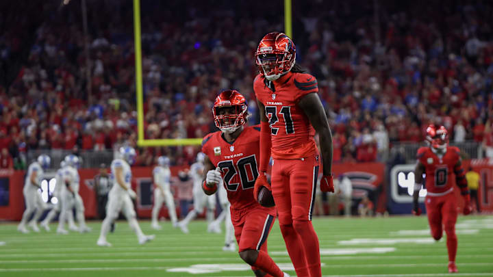 Nov 10, 2024; Houston, Texas, USA; Houston Texans safety Calen Bullock (21) reacts to his interception agains thee Detroit Lions in the second half at NRG Stadium. Mandatory Credit: Thomas B. Shea-Imagn Images