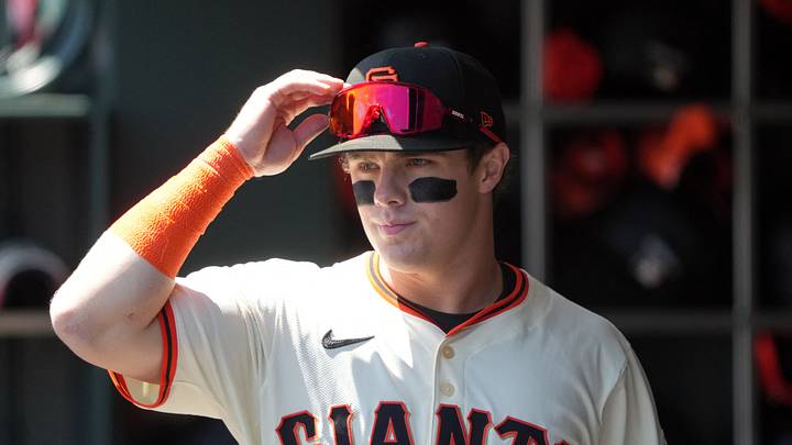 San Francisco, California, USA; San Francisco Giants right fielder Drew Gilbert (61) walks in the dugout before the game against the Washington Nationals at Oracle Park. Mandatory Credit: Darren Yamashita-Imagn Images