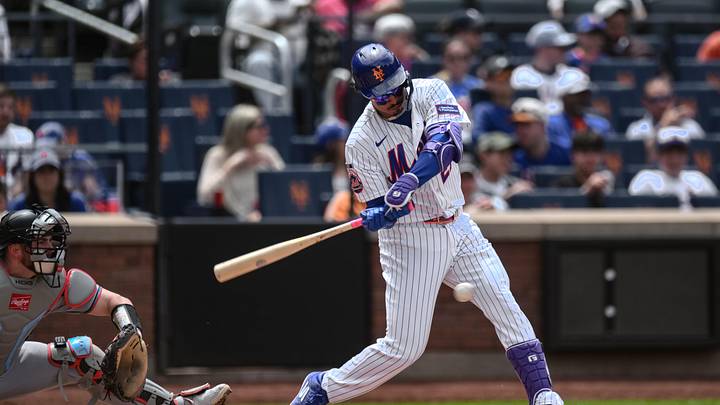 May 31, 2026; New York City, New York, USA; New York Mets first baseman Mark Vientos (27) hits a single against the Miami Marlins during the second inning at Citi Field. Mandatory Credit: John Jones-Imagn Images