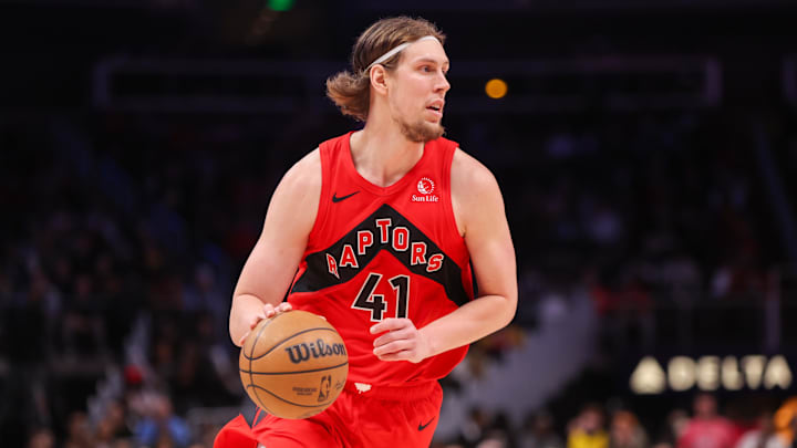 Jan 23, 2025; Atlanta, Georgia, USA; Toronto Raptors forward Kelly Olynyk (41) dribbles against the Atlanta Hawks in the third quarter at State Farm Arena. Mandatory Credit: Brett Davis-Imagn Images