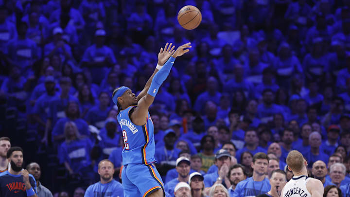 Oklahoma City Thunder guard Shai Gilgeous-Alexander (2) shoots in the third quarter against the Minnesota Timberwolves during game two of the western conference finals for the 2025 NBA Playoffs at Paycom Center. Mandatory Credit: Alonzo Adams-Imagn Images