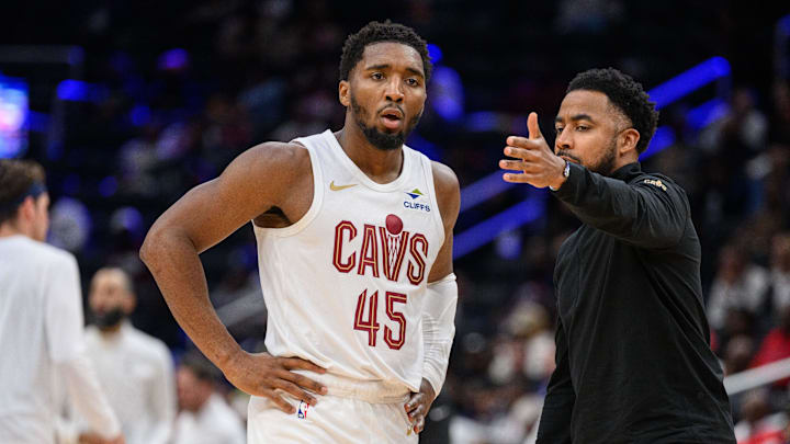 Oct 26, 2024; Washington, District of Columbia, USA; Cleveland Cavaliers guard Donovan Mitchell (45) speaks to Cleveland Cavaliers associate head coach Johnnie
Bryant during a time out in the third quarter against the Washington Wizards at Capital One Arena. Mandatory Credit: Reggie Hildred-Imagn Images Oct 26, 2024; Washington, District of Columbia, USA; Cleveland Cavaliers guard Donovan Mitchell (45) speaks to Cleveland Cavaliers associate head coach Johnnie
Bryant during a time out in the third quarter against the Washington Wizards at Capital One Arena. Mandatory Credit: Reggie Hildred-Imagn Images