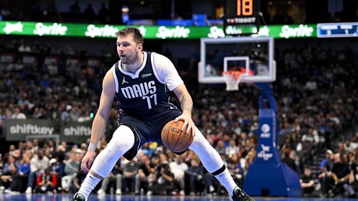 Nov 19, 2024; Dallas, Texas, USA; Dallas Mavericks guard Luka Doncic (77) brings the ball up court against the New Orleans Pelicans during the second half at the American Airlines Center. Mandatory Credit: Jerome Miron-Imagn Images